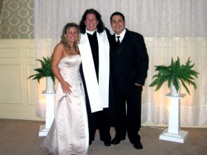 couple and officiant photo