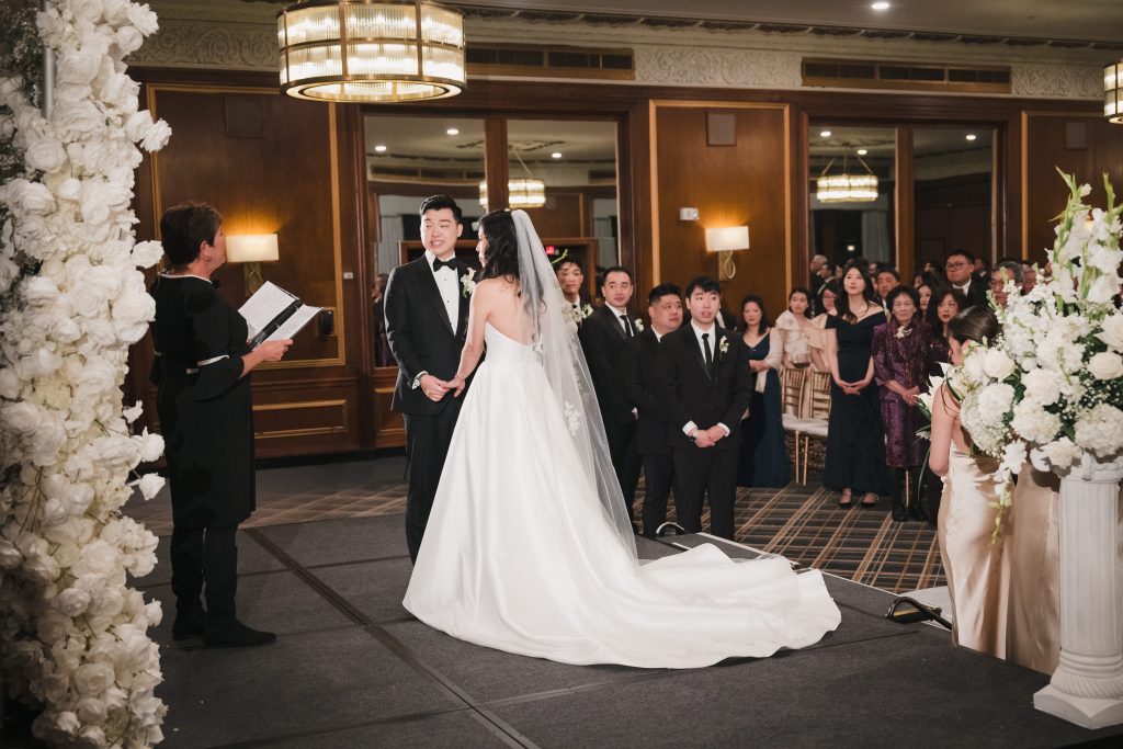 couple getting married inside boston park plaza hotel