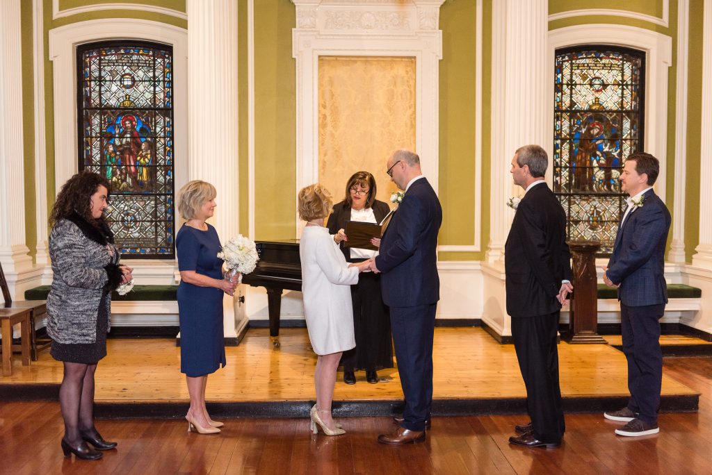 wedding with bride and groom saying vows